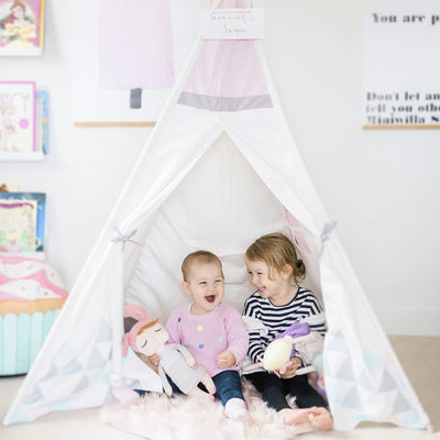 Kids having fun on their birthday party with their Cattywampus Blush Sky pink Teepee Tent