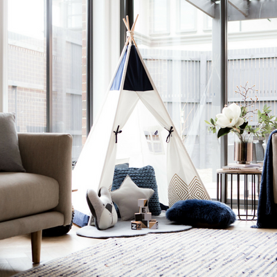 Cattywampus Gold Cloud kids teepee tent styled in the lounge room