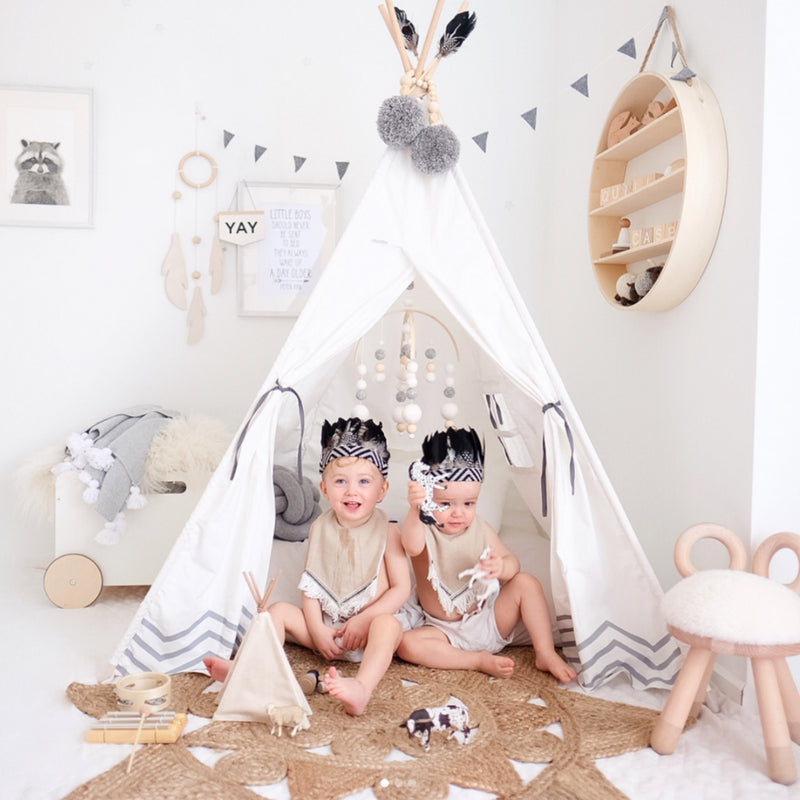 Kids playing in their Cattywampus Pearly Moon Teepee Tent in their bedroom